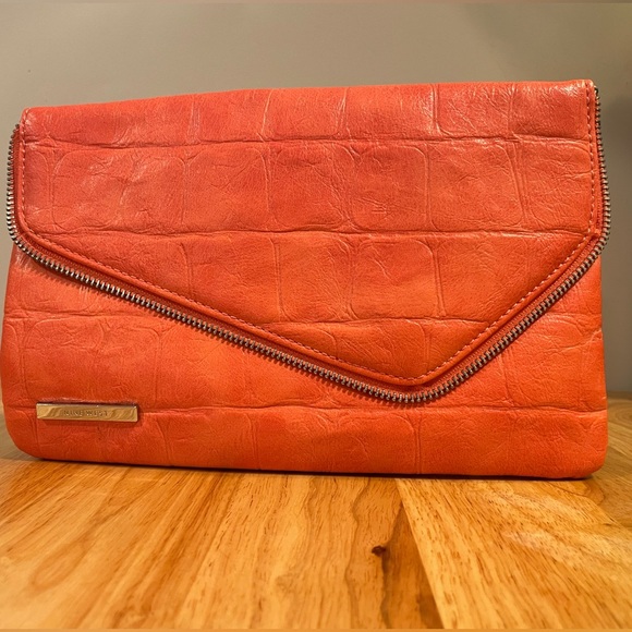 Orange envelope clutch from Nine West. Used once. - Picture 1 of 2
